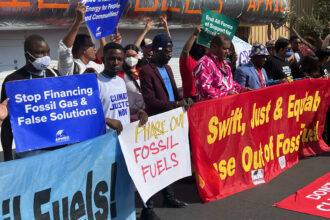 Activists at the COP27 climate talks last year in Sharm El-Sheikh, Egypt, protesting the influence of the fossil fuel industry. Credit: Bob Berwyn, Inside Climate News.