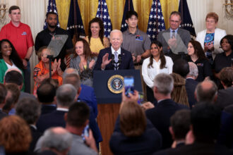 President Joe Biden delivers remarks on the first anniversary of the Inflation Reduction Act in the East Room at the White House on Wednesday. The IRA is the most extensive and ambitious climate law ever passed by Congress. Credit: Win McNamee/Getty Images.
