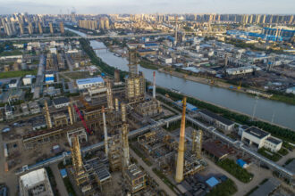 An aerial photo taken on Sept. 12, 2021 shows a chemical factory being dismantled and relocated along the Grand Canal in Huai 'an City, East China's Jiangsu Province. Credit: He Jinghua/Costfoto/Barcroft Media via Getty Images