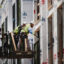 Workers install windows in a townhome complex under construction on May 15, 2017 in Chicago, Illinois. Credit: Scott Olson/Getty Images