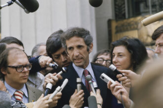 Daniel Ellsberg speaking to reporters during a recess in his federal trial in Los Angeles in May 1973. Ellsberg was accused of illegally copying and distributing the Pentagon Papers relating to the Vietnam war. A judge dismissed the charges. Credit: Bettmann Archive/Getty Images.