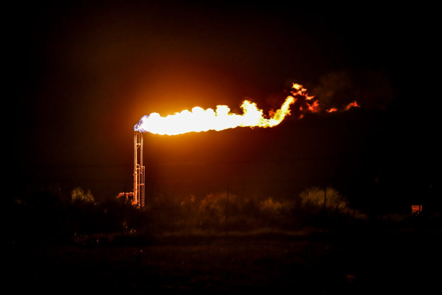 A flare burns near Cotulla, Texas, on Oct. 26, 2021. The South Texas town is located within the Eagle Ford Shale, one of the country’s top oil and gas-producing regions. Credit: Aydali Campa/Howard Center for Investigative Journalism