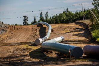 Sections of the Enbridge Line 3 pipeline on the construction site on the White Earth Nation Reservation near Wauburn, Minnesota in June 2021. Credit: Kerem Yucel/AFP via Getty Images