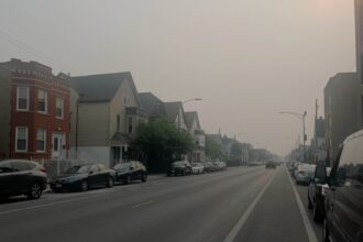 Smoke blankets the City of Chicago as a result of wildfires in Canada. Credit: Aydali Campa