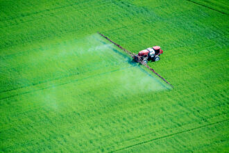 Spraying an agricultural field on the eastern shore of Maryland. Credit: Edwin Remsburg/VW Pics via Getty Images