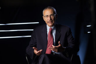 In a file photo, John Podesta, who became President Joe Biden's chief climate advisor earlier this year. He previously served as chief of staff to President Bill Clinton and counselor in President Barack Obama's White House. Credit: David Hume Kennerly/Getty Images.