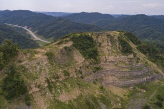 A surface mine in Floyd County, Kentucky, operated by a bankrupt company is shown here in 2021 unreclaimed. Kentucky state officials said reclamation efforts have since begun. Credit: The Courier-Journal.