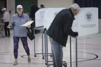 Virginia voters cast their ballots at Newton-Lee Elementary School on Tuesday in Ashburn, Virginia. Credit: Win McNamee/Getty Images